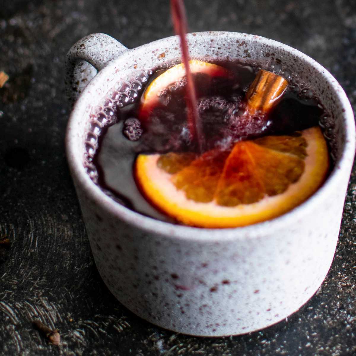 mulled wine in a mug on a table